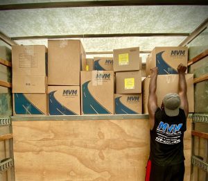 MVM moving loading boxes into moving truck